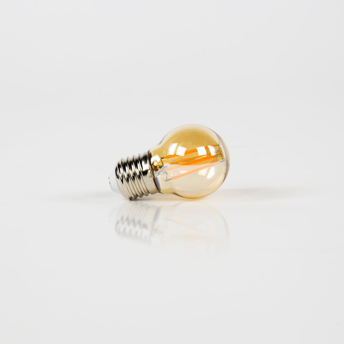 Pære LED [G45] filament kugle Ø4,5cm / Ravfarvet glas